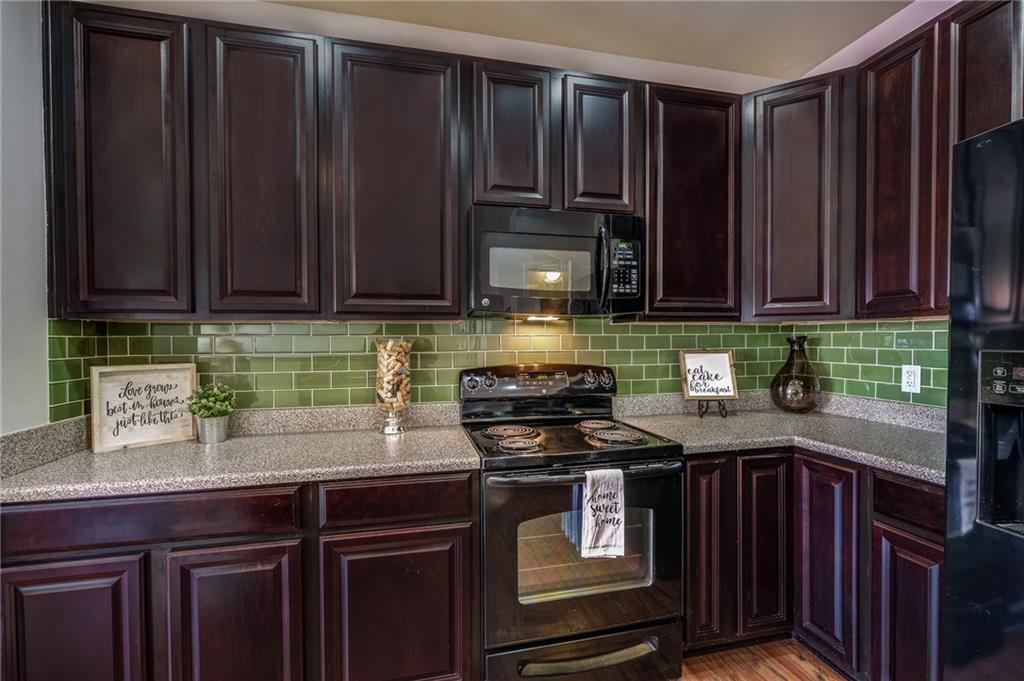 42" Tall, Dark Expresso Cabinets with new Subway Tile Backsplash