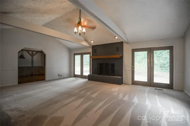 a kitchen with stainless steel appliances granite countertop a sink and cabinets