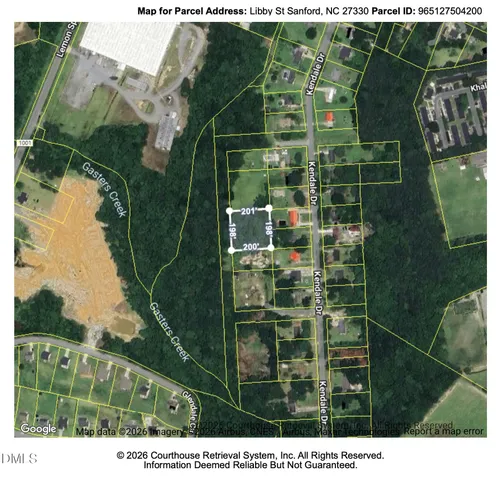 a picture of a bathroom with a shower curtain