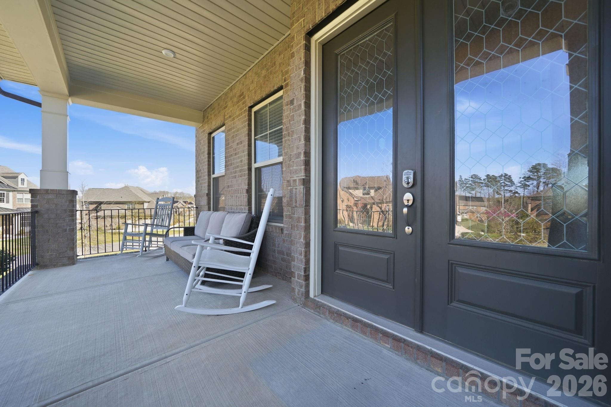 8920 Branch Brook Place Huntersville, NC 28078 - Photo 3 of 41 a view of two chairs in the room next to a window