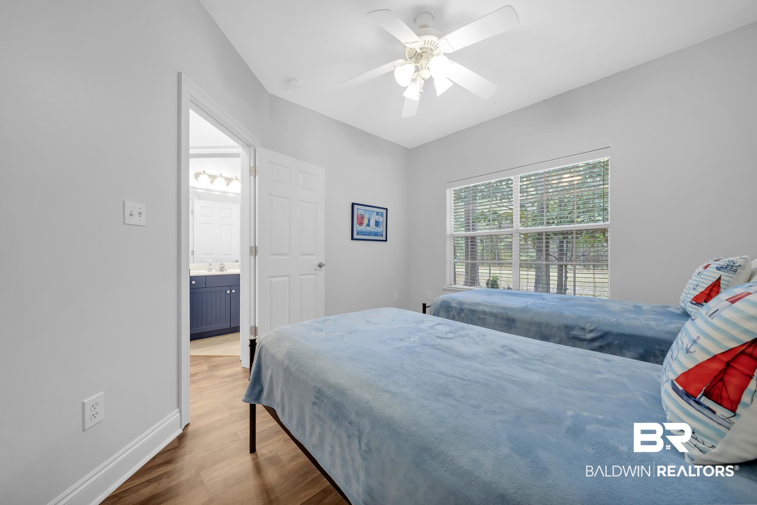 105 Mark Twain Loop Foley, AL 36535 - Photo 17 of 43 Bedroom featuring dark wood finished floors and a ceiling fan