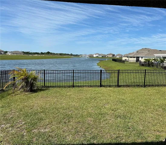 an aerial view of a house with a garden