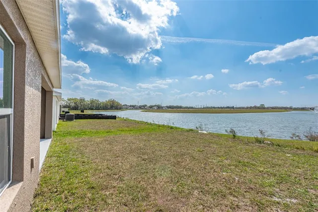 an aerial view of a house with a garden