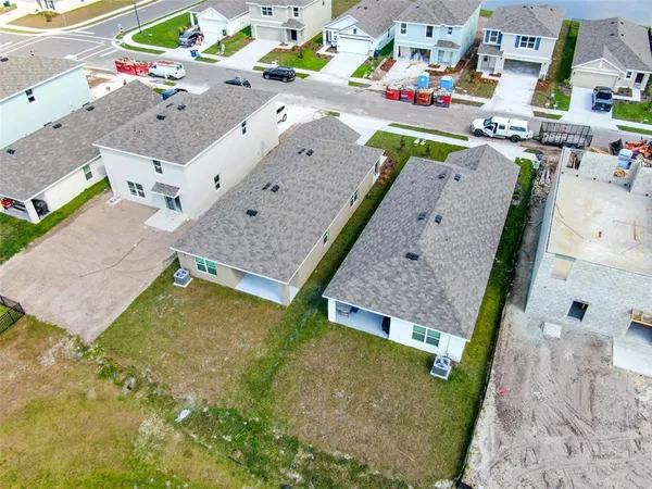 a view of swimming pool with outdoor seating