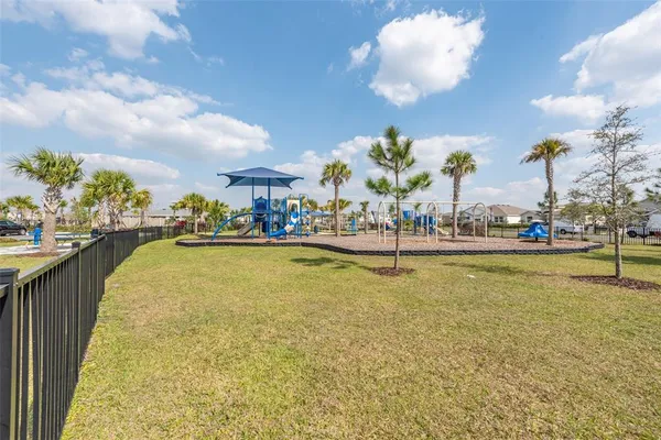 a view of swimming pool with a balcony