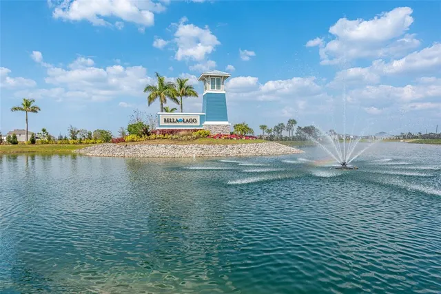 an aerial view of a house with a swimming pool yard and outdoor seating