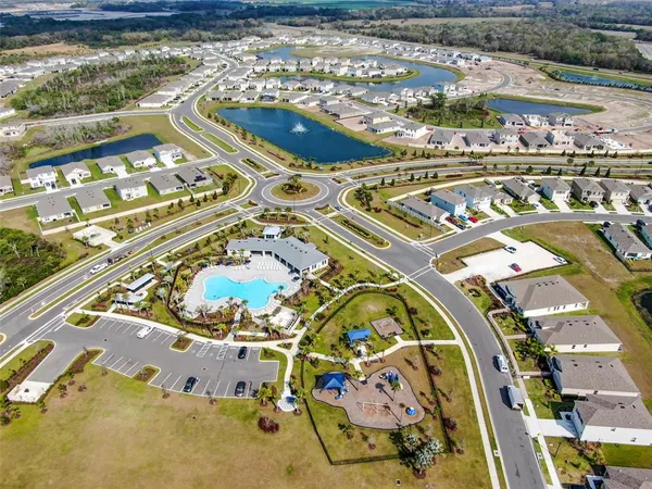 a view of outdoor space with swimming pool and lounge chair