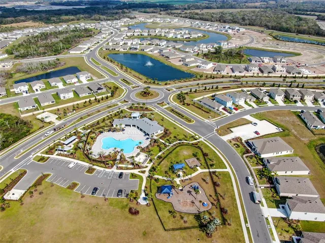 a view of outdoor space with swimming pool and lounge chair
