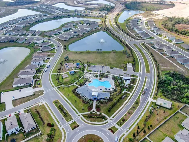 a view of a swimming pool with a patio