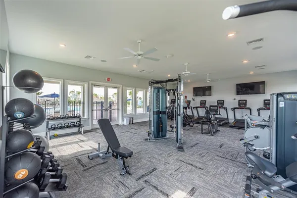 a view of a swimming pool with a table and chairs