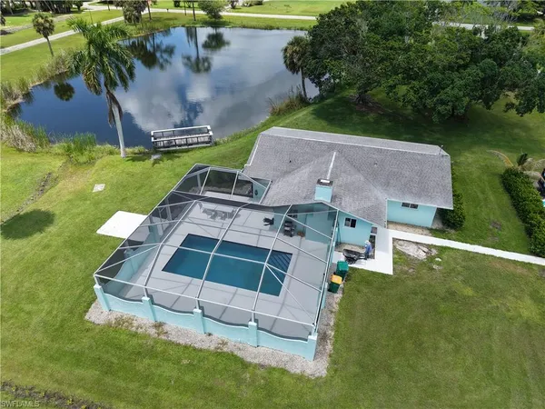 an aerial view of a house with a garden