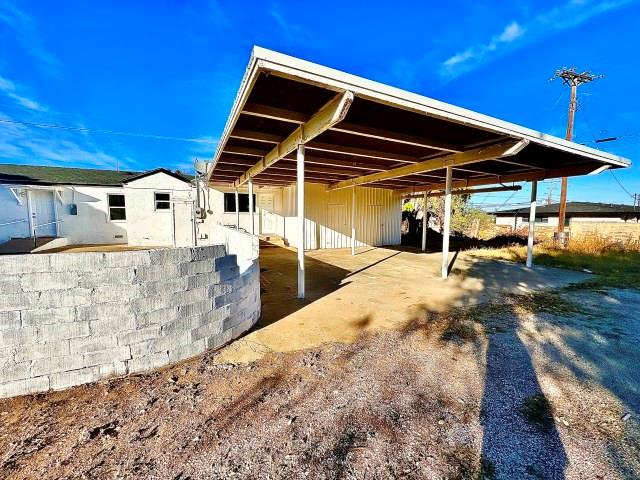 409 SW Avenue East Seminole, TX 79360 - Photo 3 of 16 a view of a house with backyard