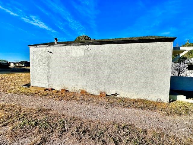 409 SW Avenue East Seminole, TX 79360 - Photo 4 of 16 a view of a dry yard with wooden fence