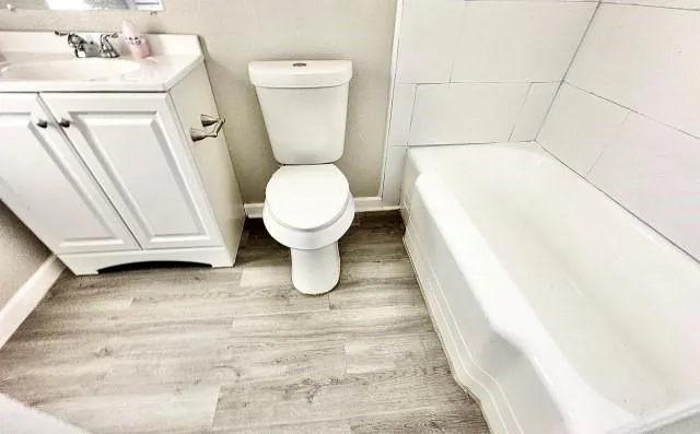 a bathroom with a sink and a toilet