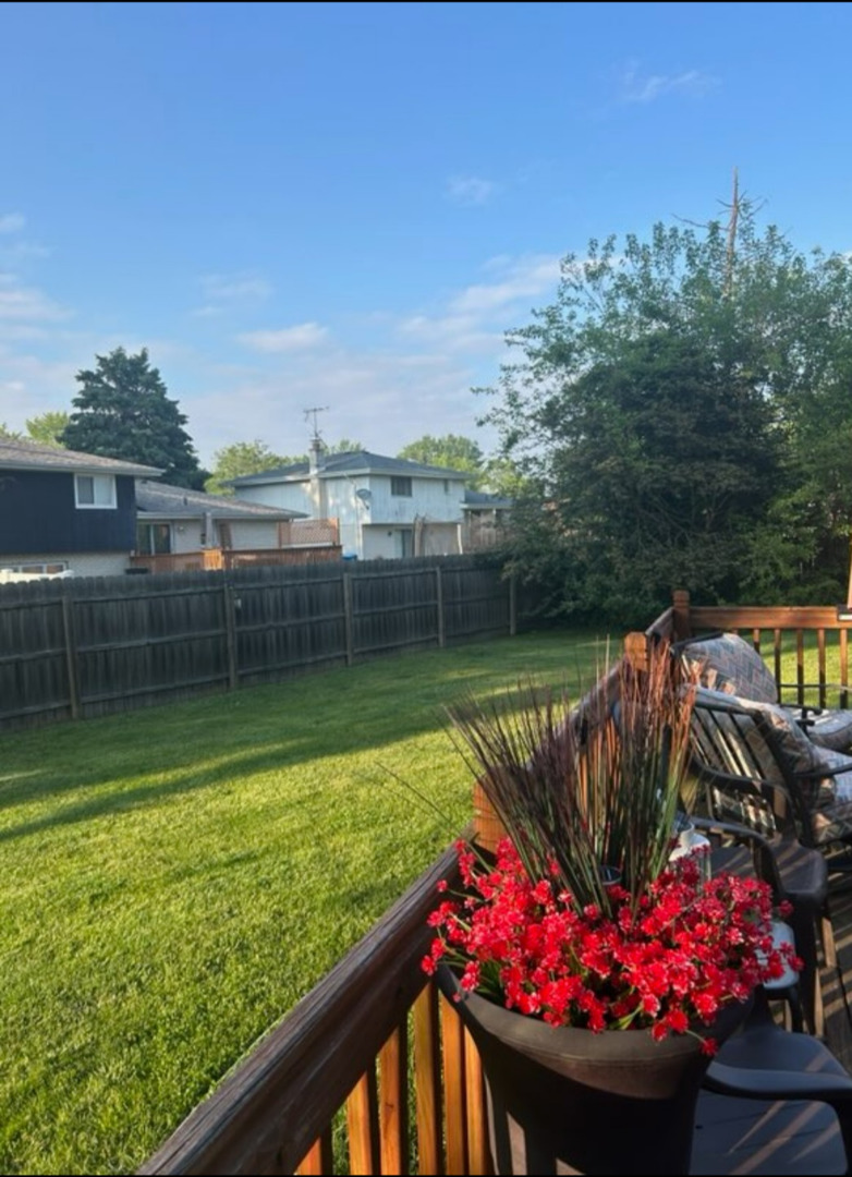 15 Huntley Court Crete, IL 60417 - Photo 2 of 2 a view of a lake from a balcony
