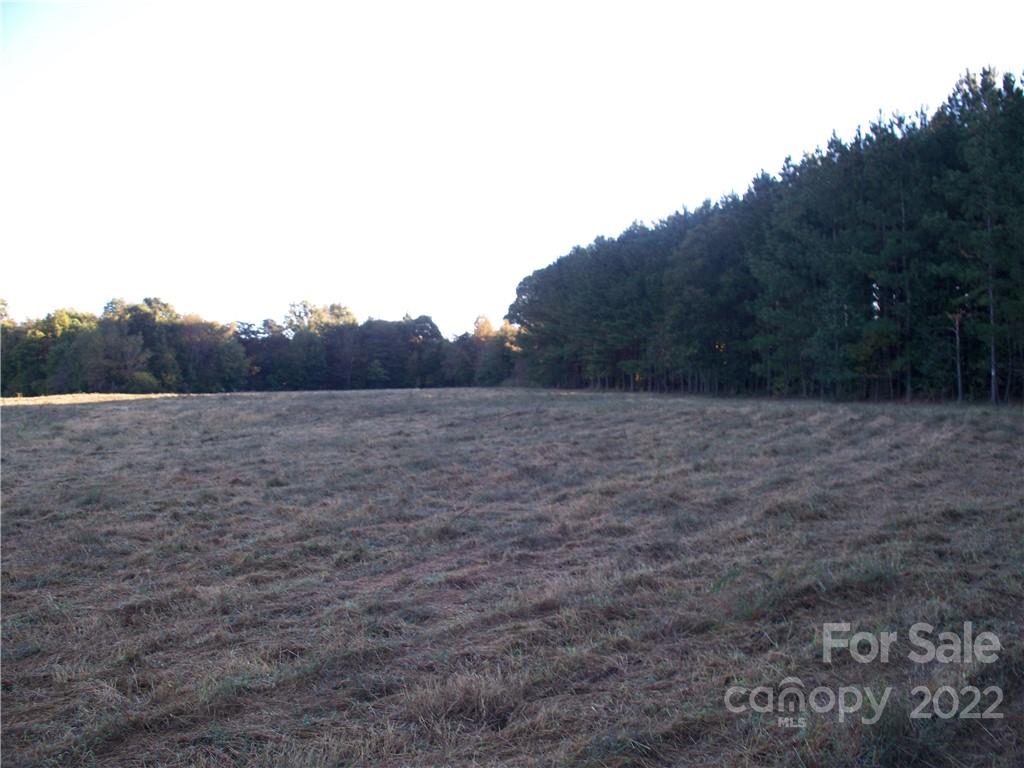 0 Crouse Road, Unit 1 Crouse, NC 28033 - Photo 1 of 9 a view of a field with trees in background