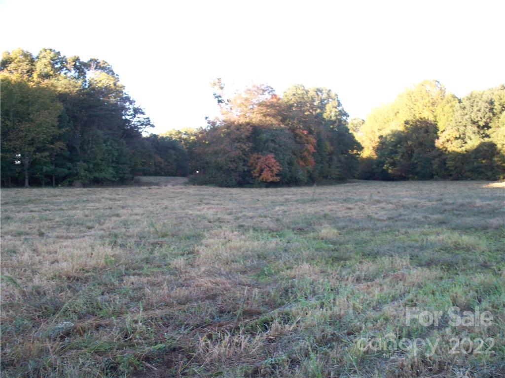 0 Crouse Road, Unit 1 Crouse, NC 28033 - Photo 5 of 9 a view of a field with trees in background
