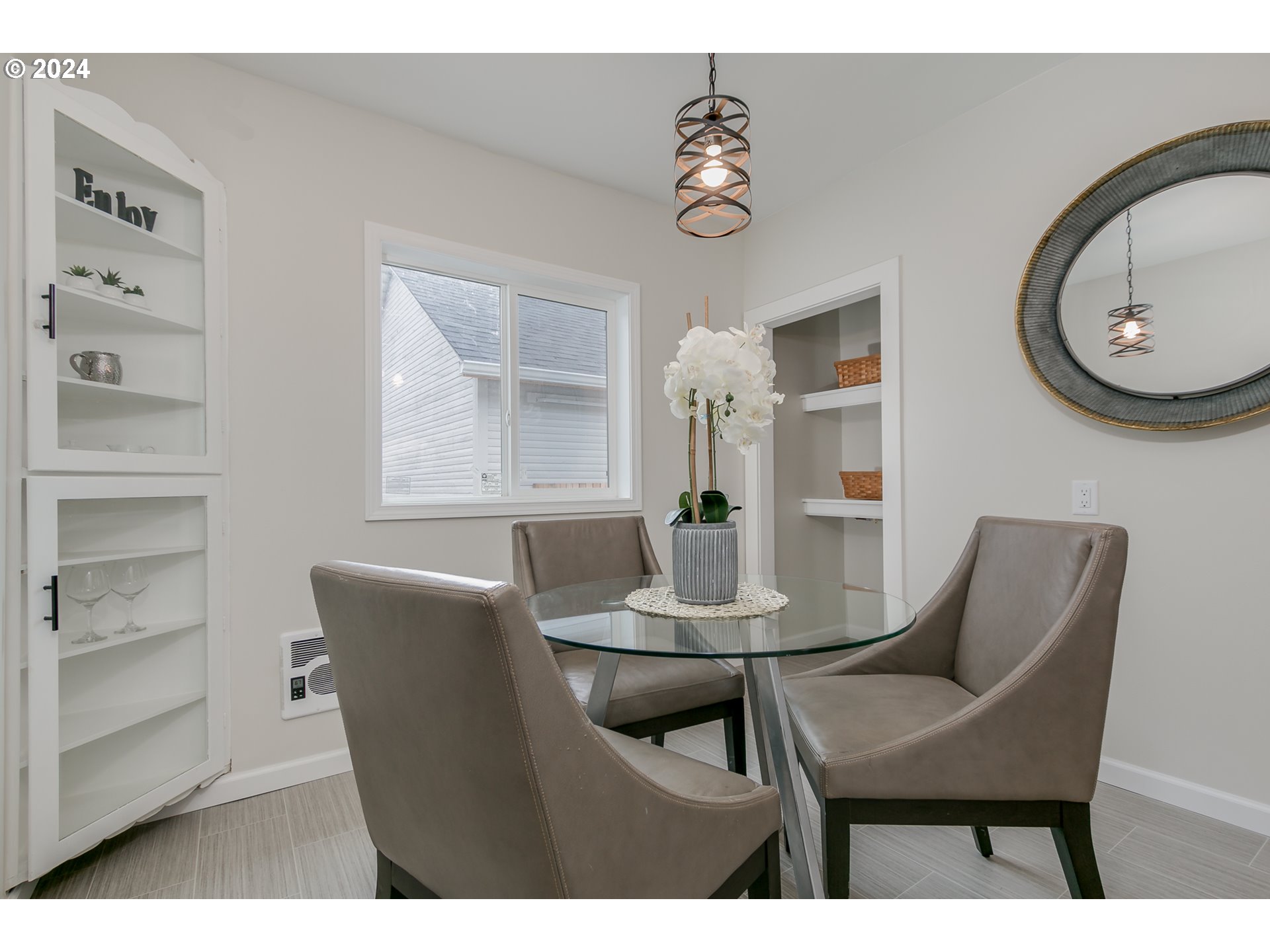 1467 Main Street Springfield, OR 97477 - Photo 12 of 29 a view of a dining room with furniture and chandelier