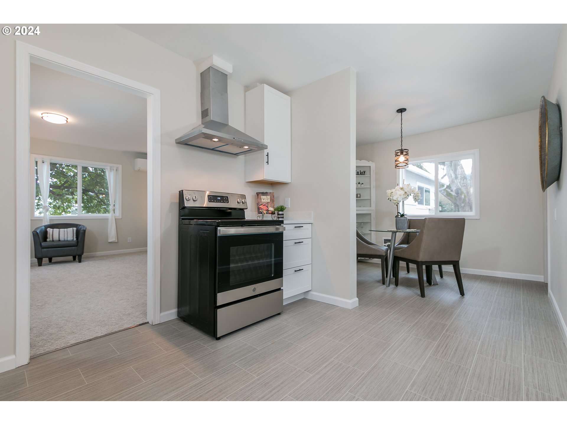 1467 Main Street Springfield, OR 97477 - Photo 15 of 29 a kitchen with stainless steel appliances a stove a sink and a refrigerator