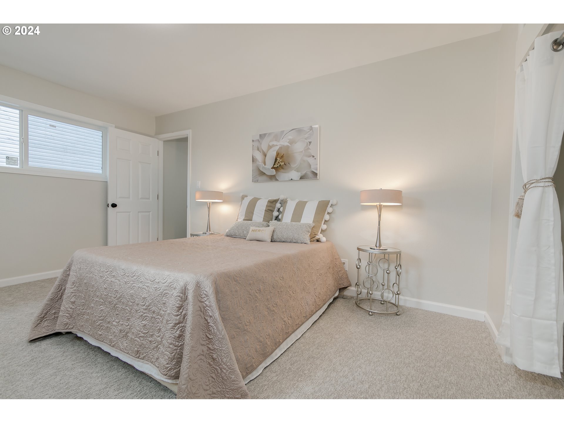 1467 Main Street Springfield, OR 97477 - Photo 17 of 29 a bedroom with a bed and a night stand