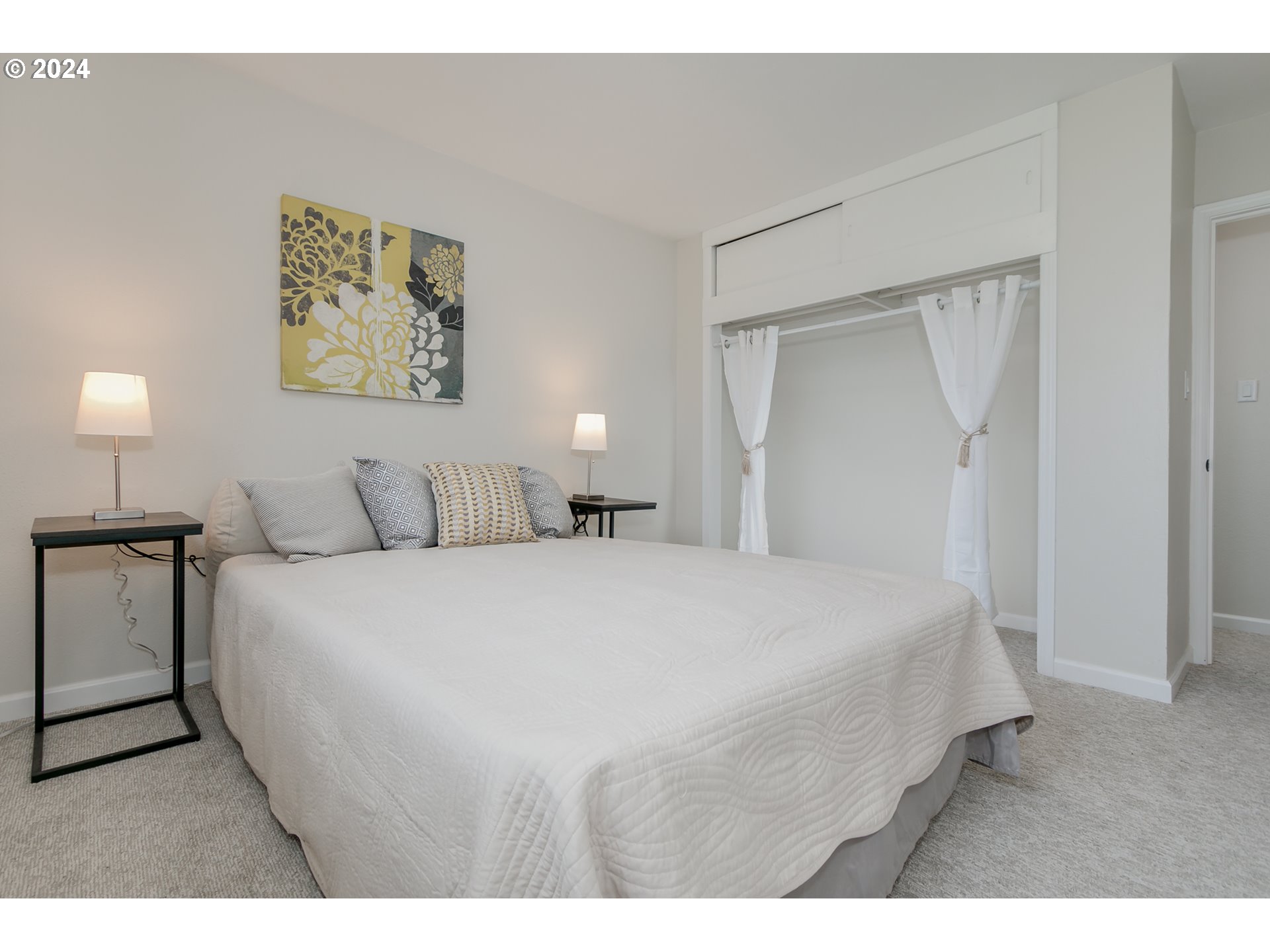 1467 Main Street Springfield, OR 97477 - Photo 19 of 29 a bedroom with a bed and a night stand