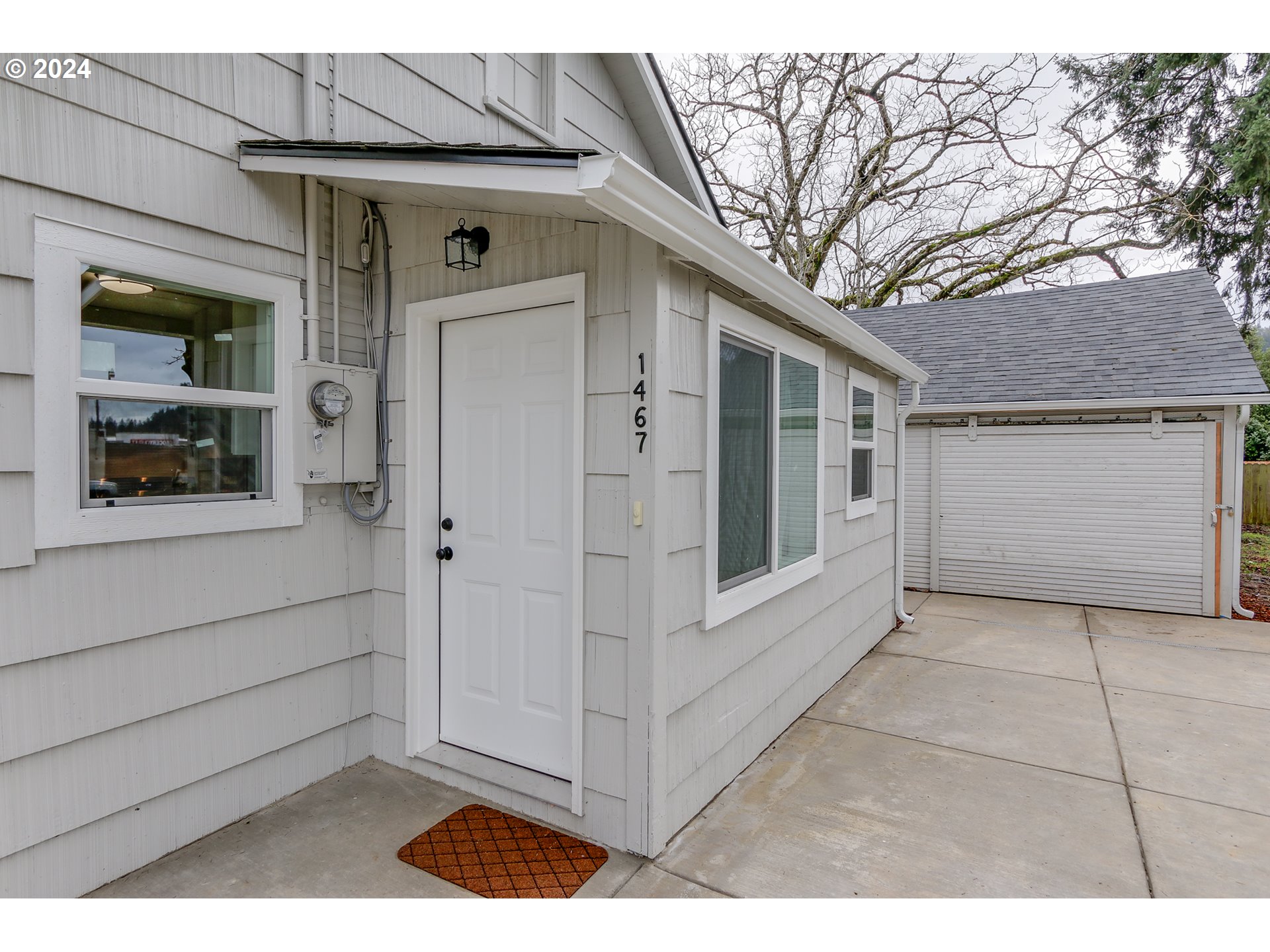 1467 Main Street Springfield, OR 97477 - Photo 23 of 29 a view of a car garage door