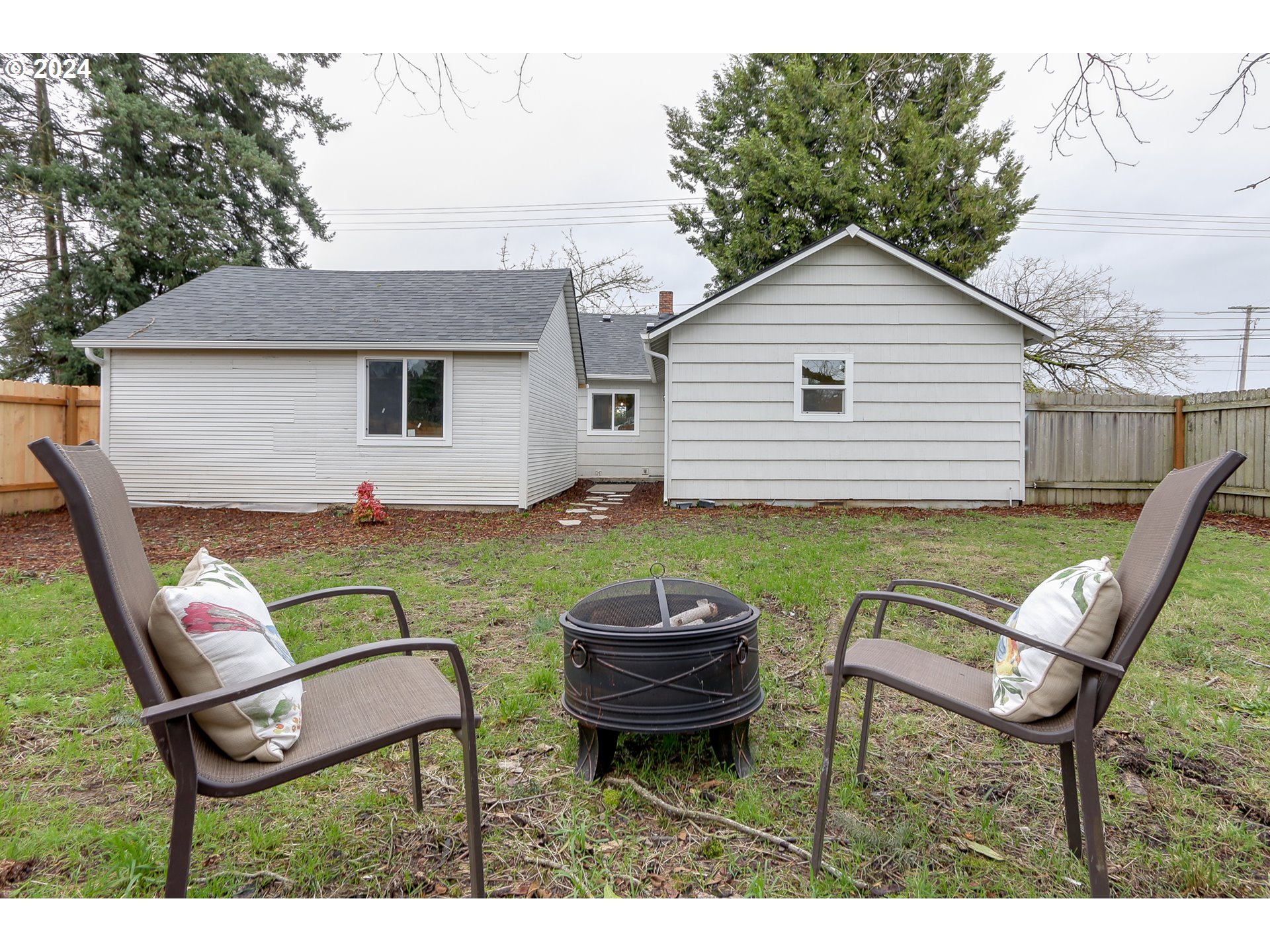 1467 Main Street Springfield, OR 97477 - Photo 26 of 29 a house view with a seating space