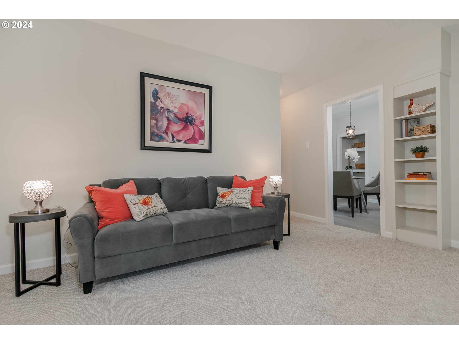 1467 Main Street Springfield, OR 97477 - Photo 9 of 29 a living room with furniture and a book shelf
