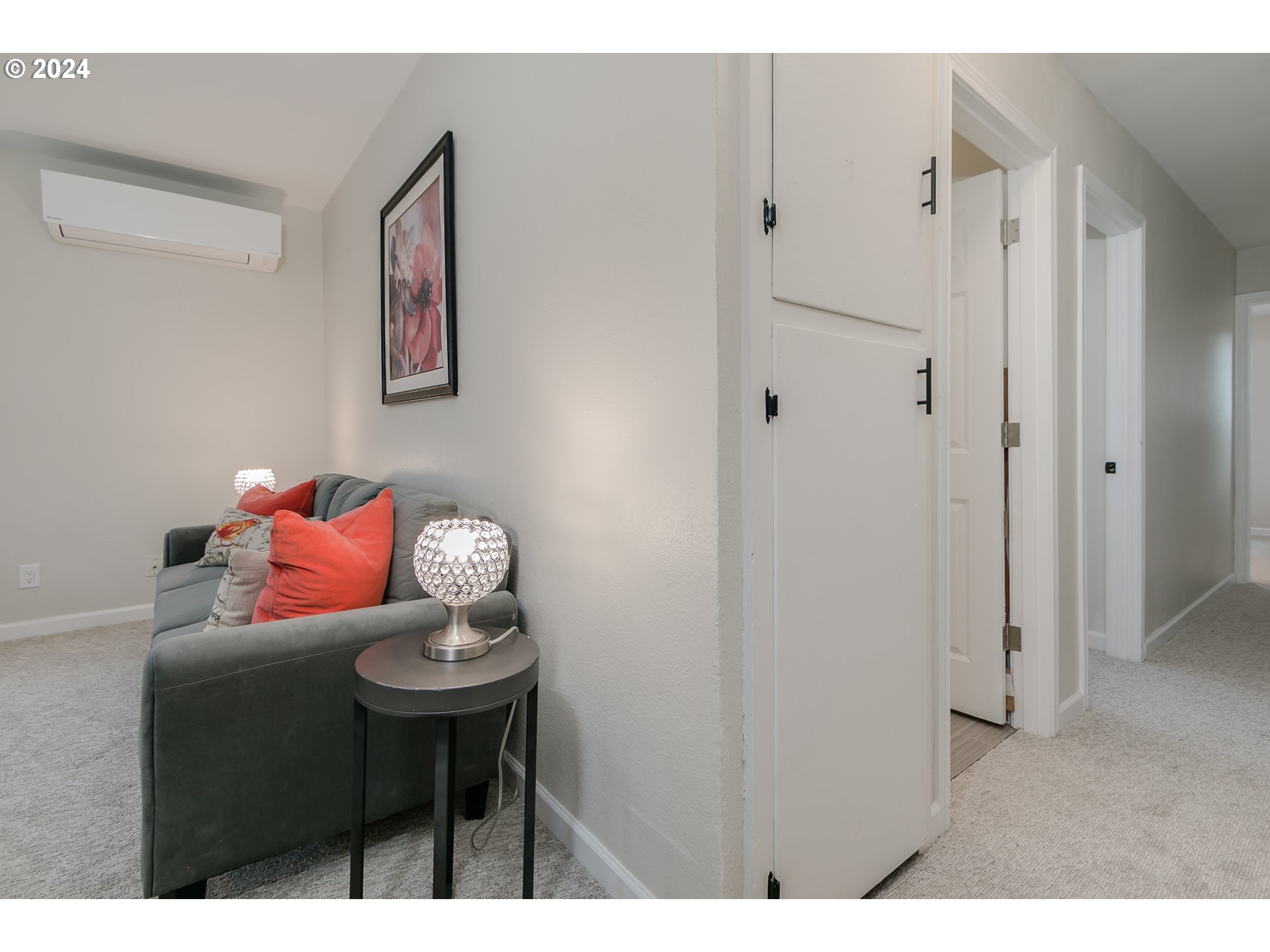 1467 Main Street Springfield, OR 97477 - Photo 10 of 29 a bedroom with a bed and a table in it