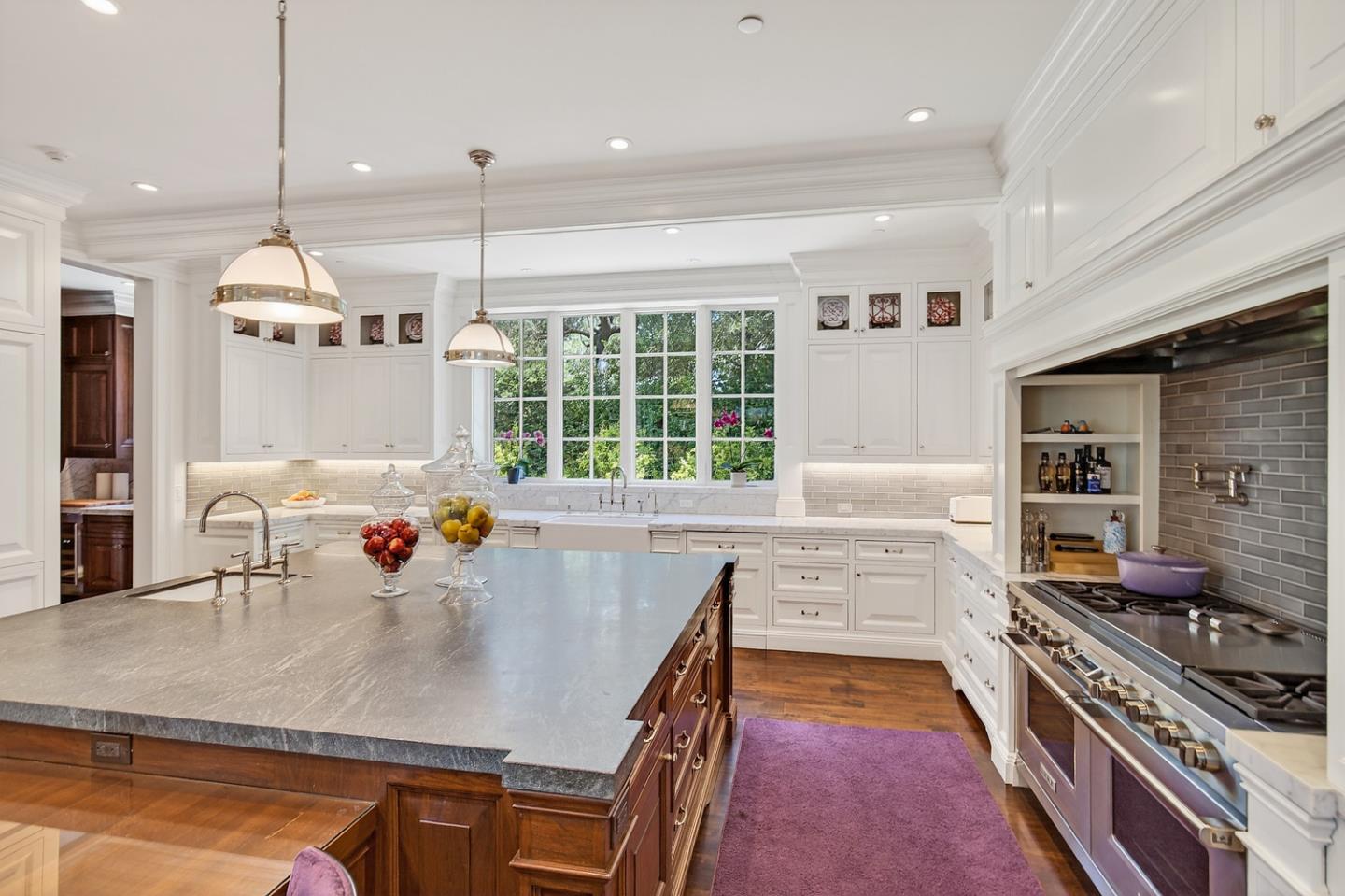 351 Walsh Road Atherton, CA 94027 - Photo 10 of 65 a kitchen with a stove a sink and a refrigerator