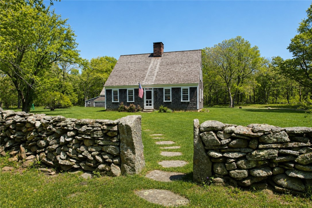 307 Stony Fort Road Saunderstown, RI 02874 - Photo 3 of 48 Granite bounds flank the steppingstone walkway to the front door.