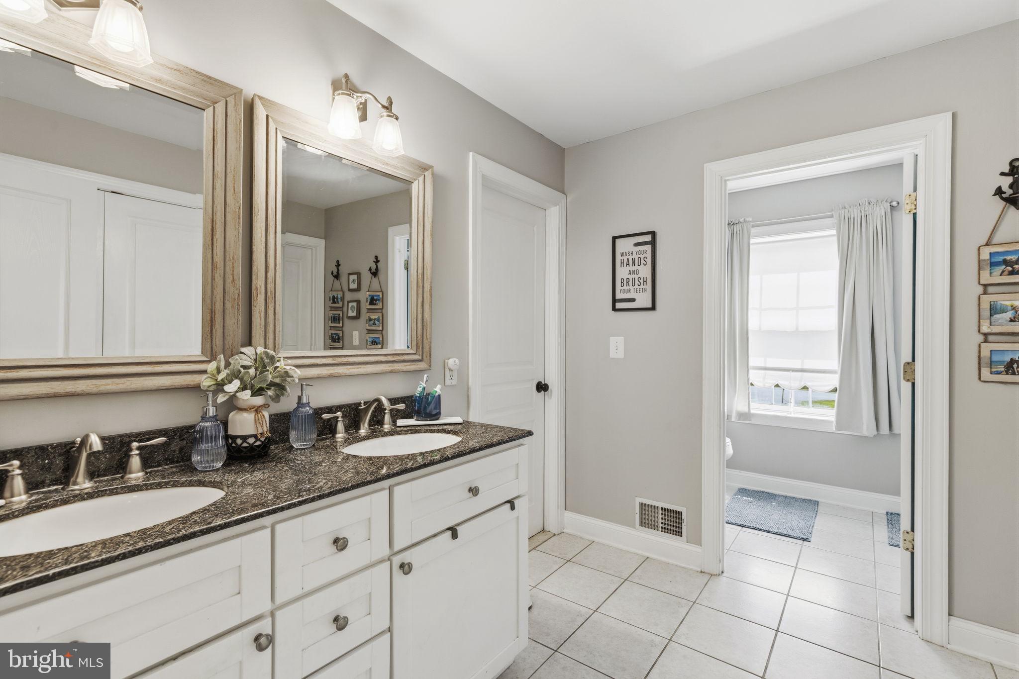 2254 Phillips Mill Road Forest Hill, MD 21050 - Photo 37 of 63 Hall bath with double vanity & tub/shower combo