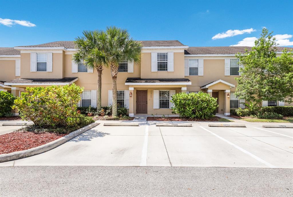 14926 Amberjack Terrace Lakewood Ranch, FL 34202 - Photo 1 of 1 a front view of a house with garden