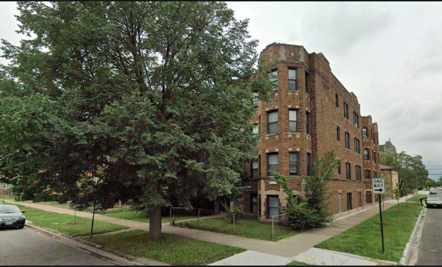 1739 West 80th Street, Unit 17933 Chicago, IL 60620 - Photo 1 of 17 a view of a large building with a tree in front of it