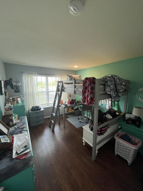 2212 Rising Hill Road Whitehall, PA 18052 - Photo 16 of 21 Rich hardwood floors complement a versatile bedroom space with ample natural light.