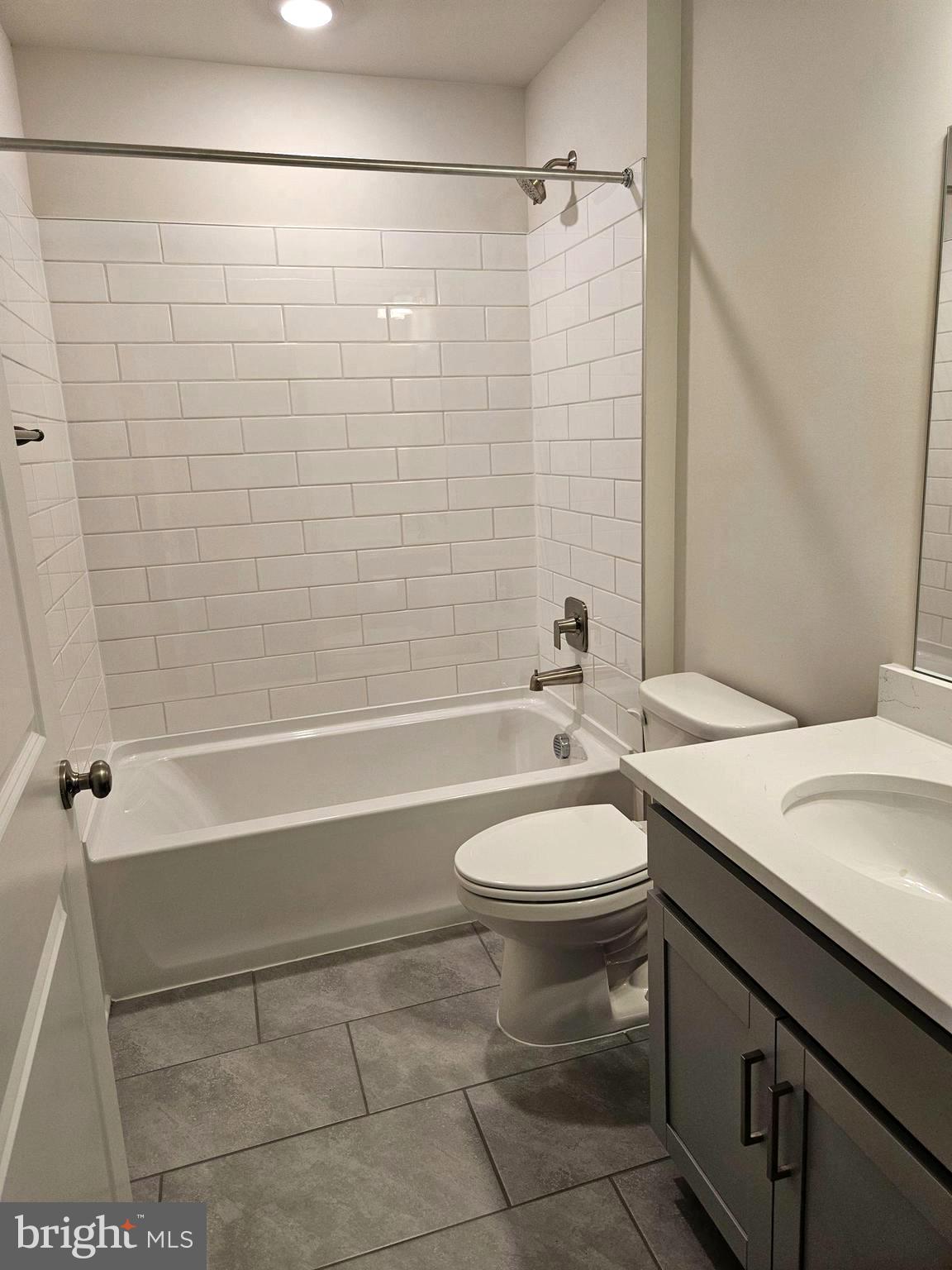 1815 Reese Court Winchester, VA 22601 - Photo 4 of 14 a bathroom with a sink a toilet and shower