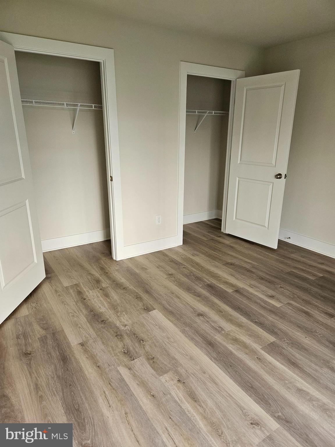 1815 Reese Court Winchester, VA 22601 - Photo 7 of 14 a view of an empty room with wooden floor