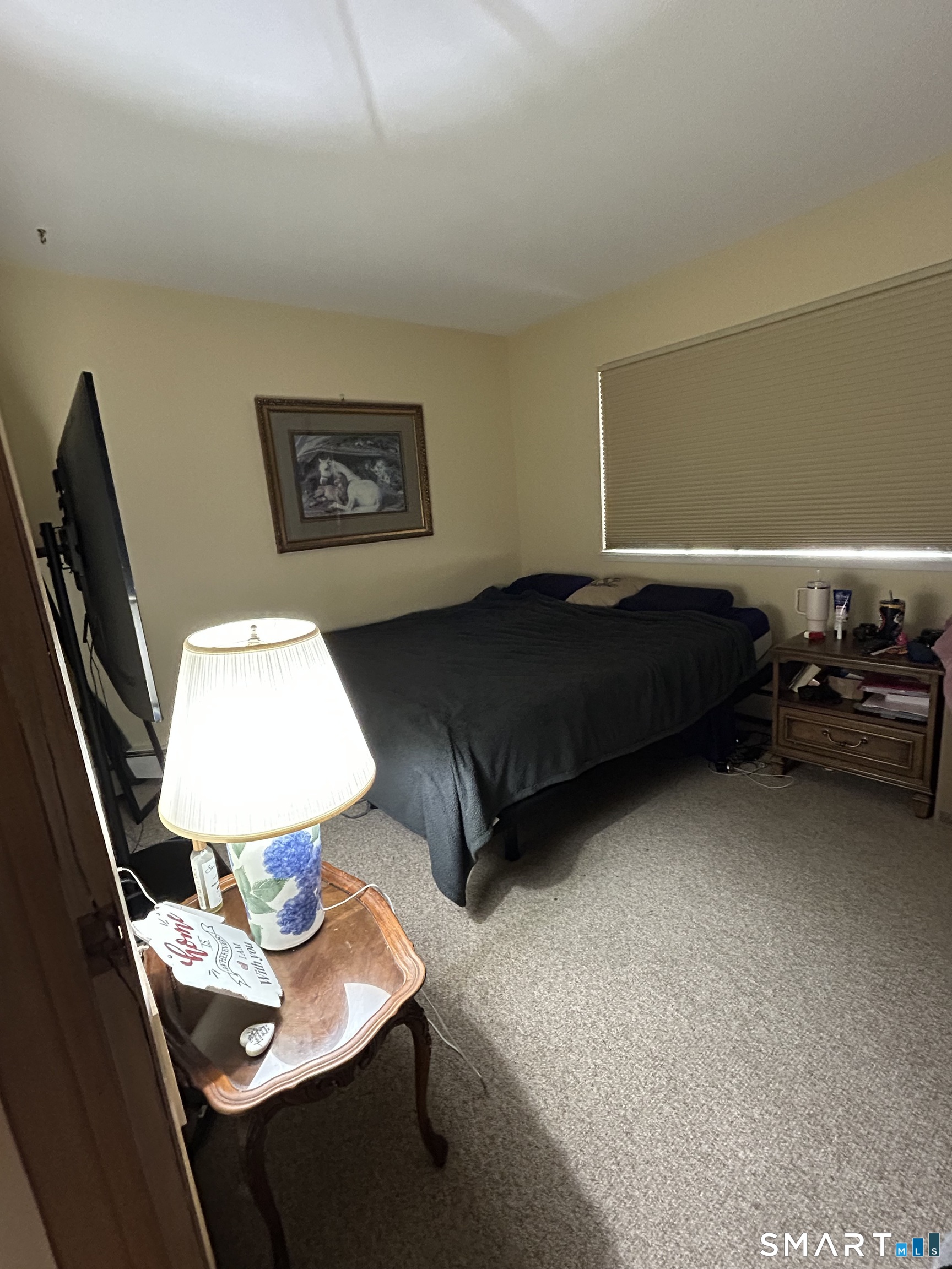 126 Sherman Hill Road, Unit B12 Woodbury, CT 06798 - Photo 23 of 27 a living room with furniture