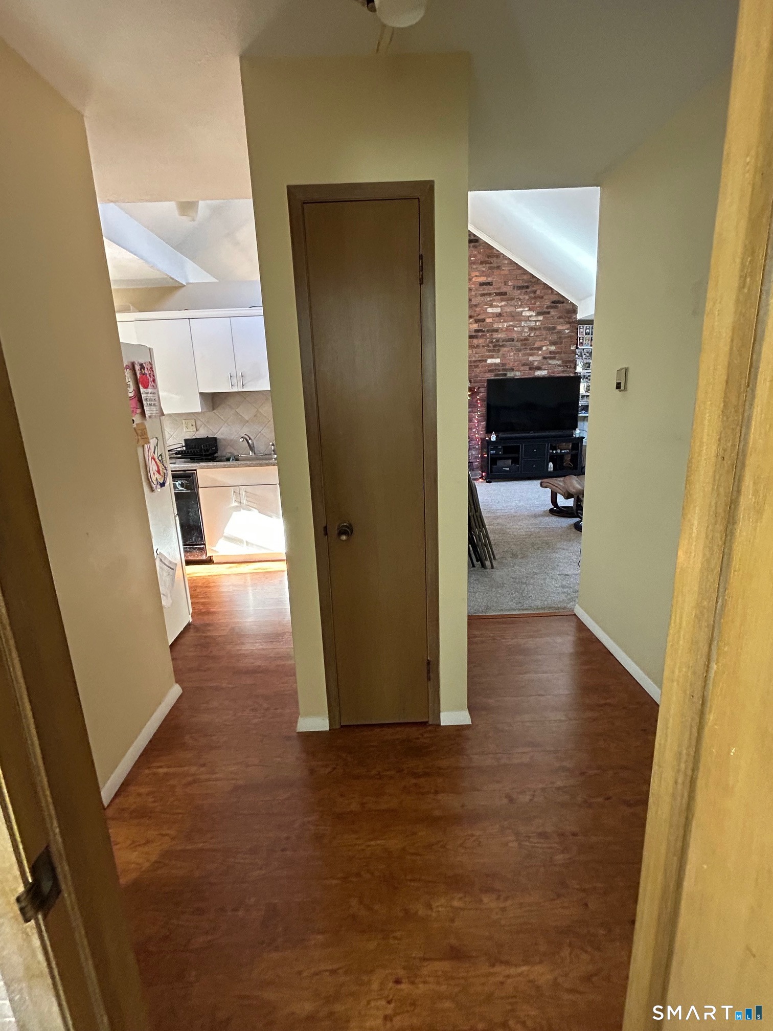 126 Sherman Hill Road, Unit B12 Woodbury, CT 06798 - Photo 24 of 27 a view of a hallway view with living room