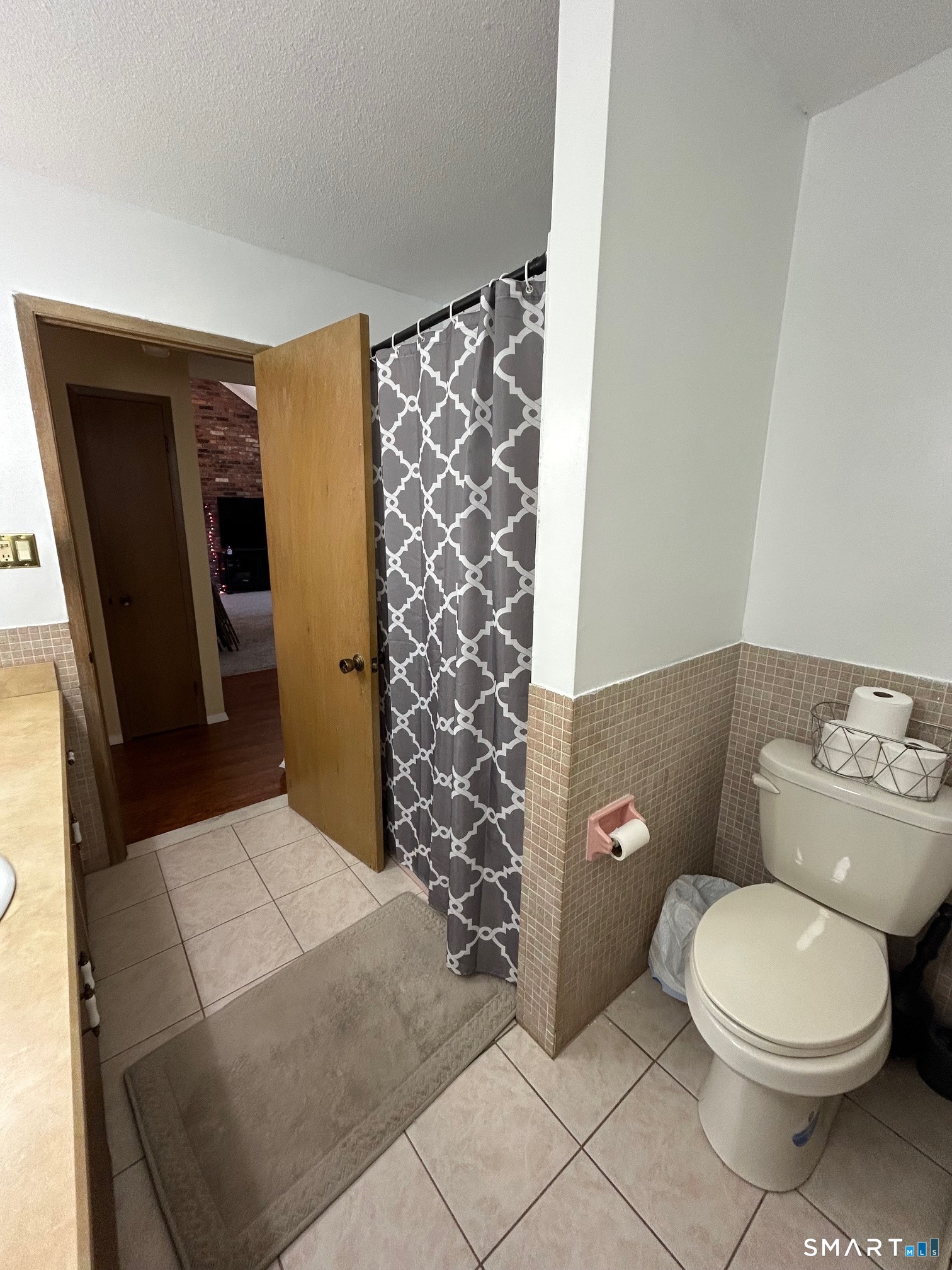 126 Sherman Hill Road, Unit B12 Woodbury, CT 06798 - Photo 27 of 27 a bathroom with a toilet and a shower