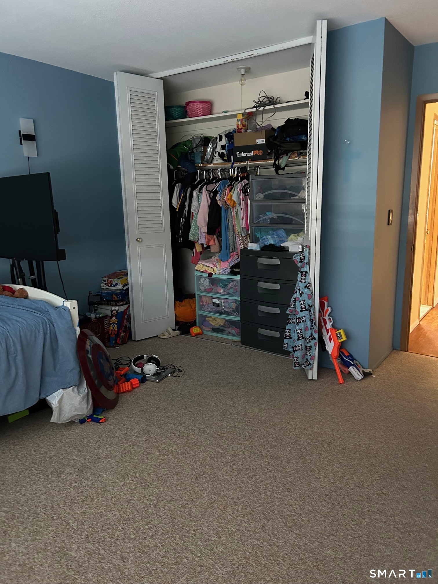 126 Sherman Hill Road, Unit B12 Woodbury, CT 06798 - Photo 7 of 27 a view of a room with toys