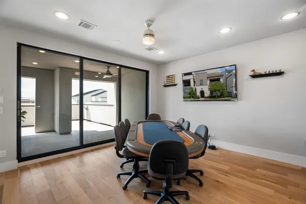 a workspace with furniture and a window