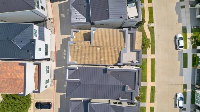 a aerial view of residential houses with outdoor space
