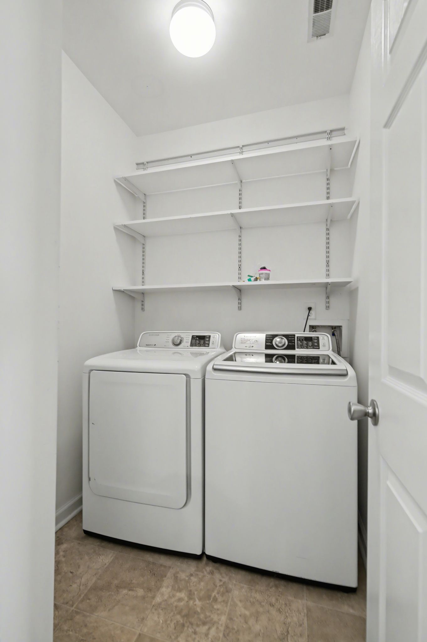 2521 Pennington Bend Road, Unit 211 Nashville, TN 37214 - Photo 17 of 21 a utility room with dryer and washer