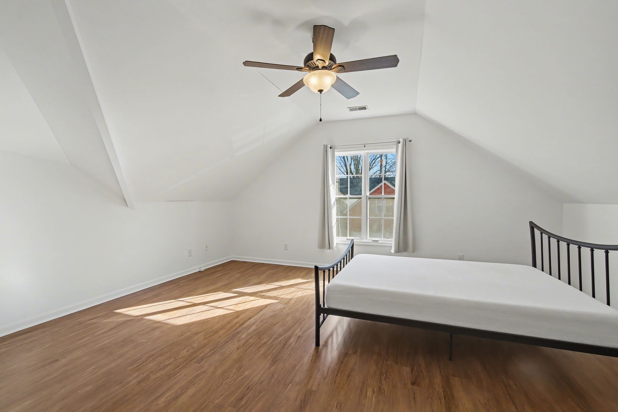 2521 Pennington Bend Road, Unit 211 Nashville, TN 37214 - Photo 20 of 21 a bedroom with a bed and a window