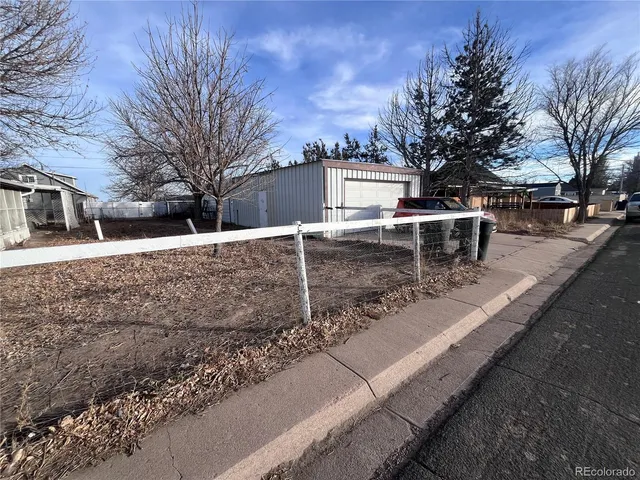 a view of a outdoor space with table and chairs