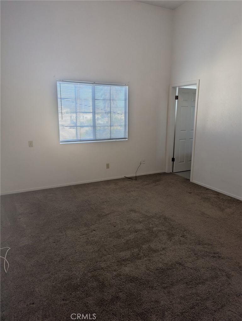385 McCarthy Avenue, Unit D Oceano, CA 93445 - Photo 12 of 15 an empty room with windows