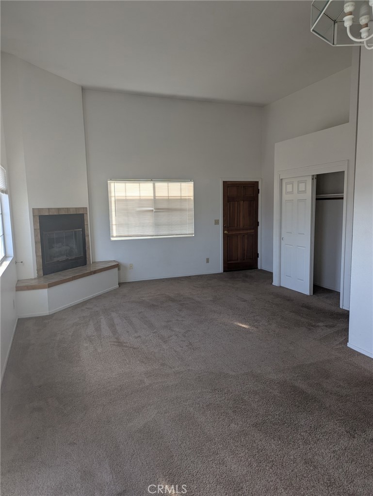385 McCarthy Avenue, Unit D Oceano, CA 93445 - Photo 2 of 15 a view of empty room with a fireplace