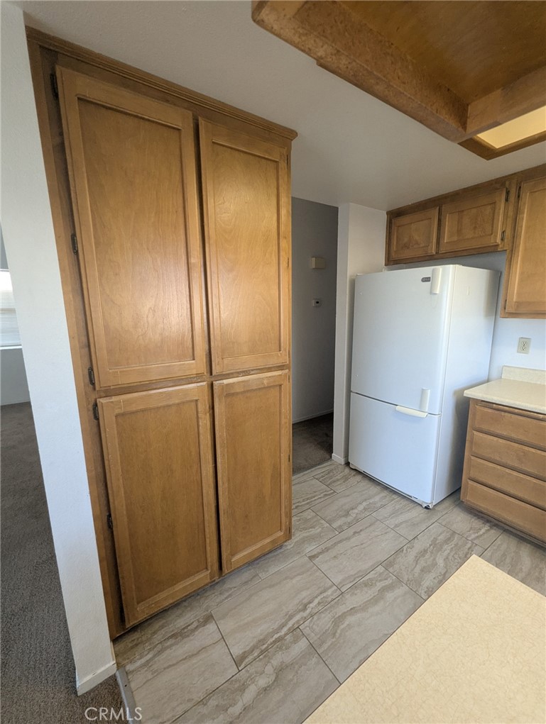 385 McCarthy Avenue, Unit D Oceano, CA 93445 - Photo 6 of 15 a bathroom with a refrigerator and a sink