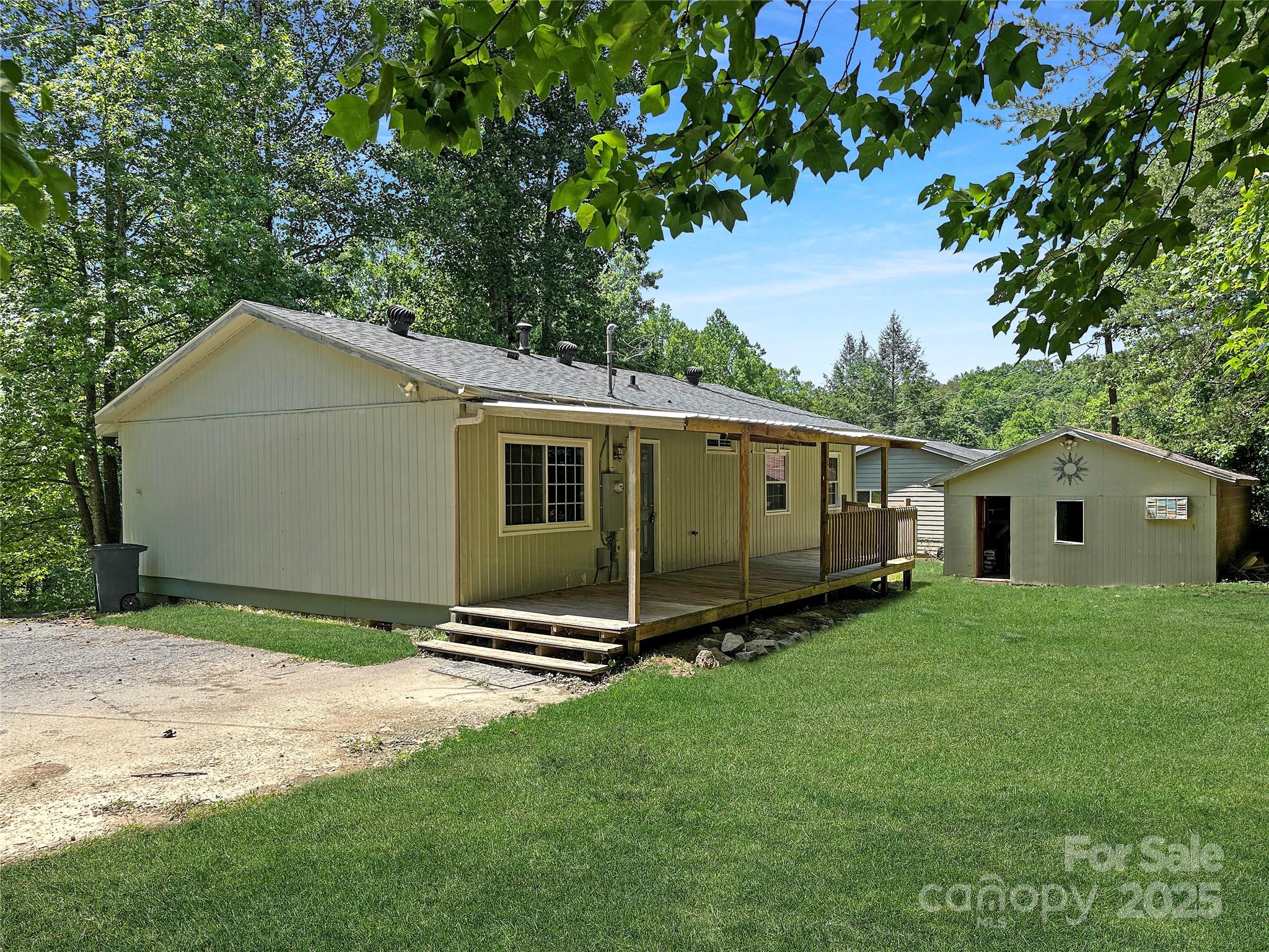 488 John Swofford Road Nebo, NC 28761 - Photo 2 of 18 a view of a backyard of the house